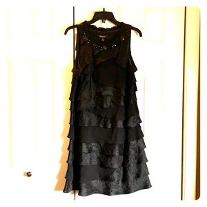 Sleeveless black cocktail dress